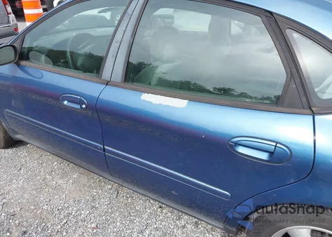 2002 Ford Taurus Ses z USA, uszkodzony, nr VIN 1FAFP55U22G165305